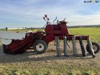 Hesston 300M windrower 8