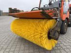 Holder C2.34 with broom and salt spreader 11