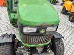 John Deere 2320 with broom and salt spreader 47