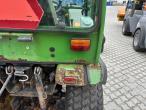 John Deere 2320 with broom and salt spreader 71