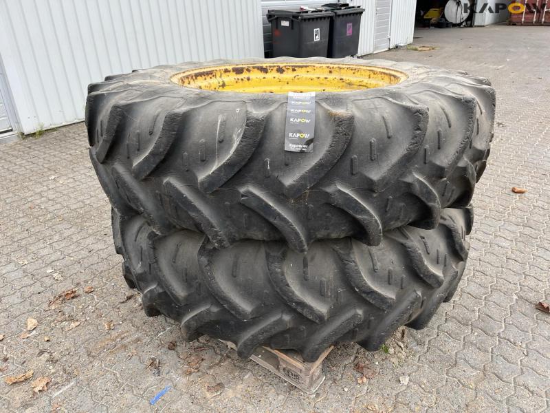 John Deere wheel with cast ring. 1