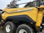 New Holland Bigbaler 1290 with POMI bale trailer 66