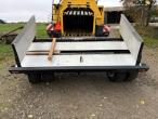 New Holland Bigbaler 1290 with POMI bale trailer 76