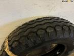 Large lot of tires + shelving 61